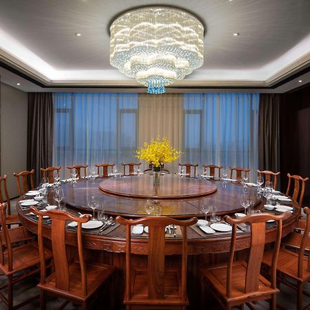 Отель Ramada Wyndham Zhengzhou Xinzheng Xinzheng  Экстерьер фото