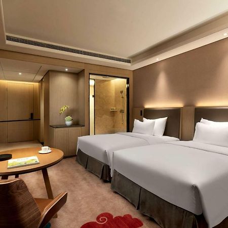 Отель Ramada Wyndham Zhengzhou Xinzheng Xinzheng  Экстерьер фото