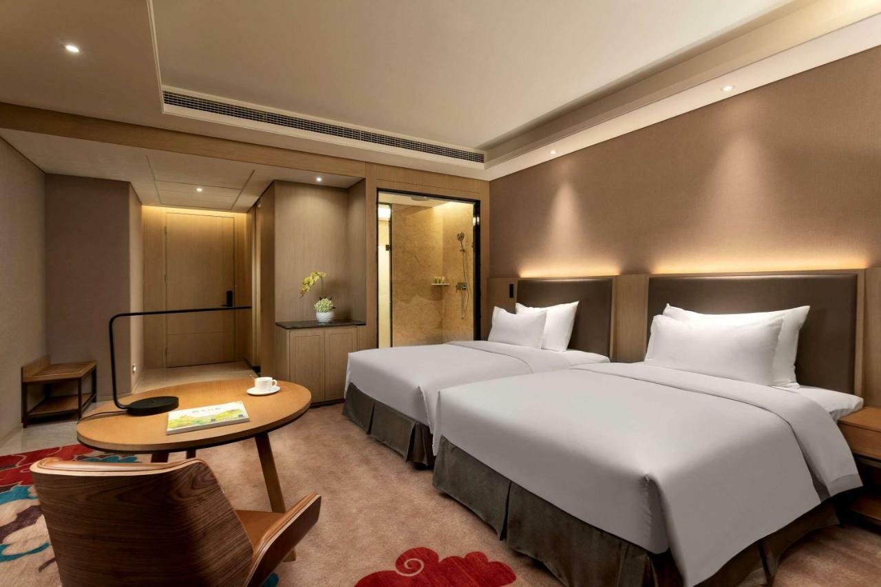 Отель Ramada Wyndham Zhengzhou Xinzheng Xinzheng  Экстерьер фото